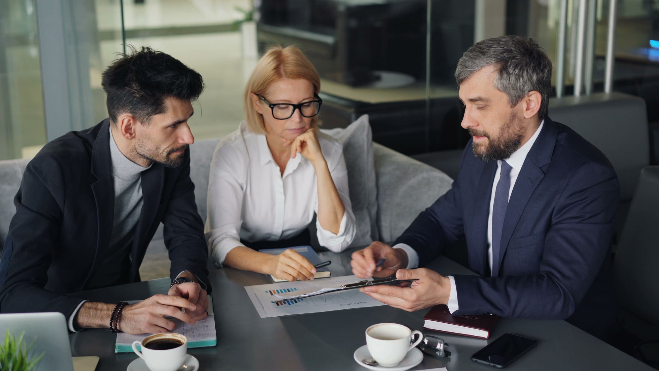 Consultants reviewing strategy in a modern office